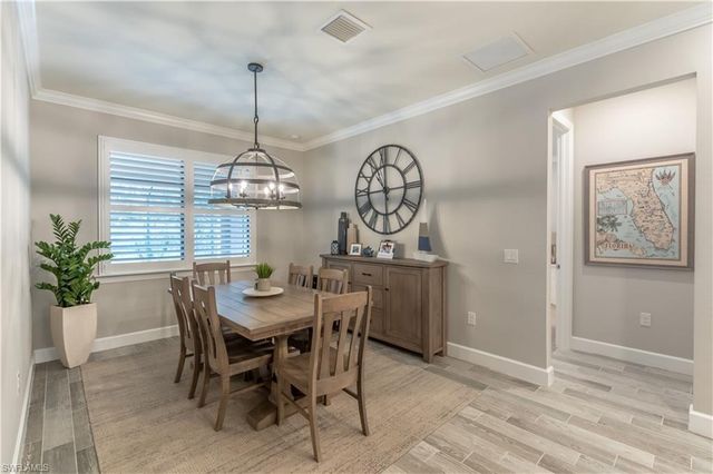 7473 Winding Cypress DR, Naples, FL 34114