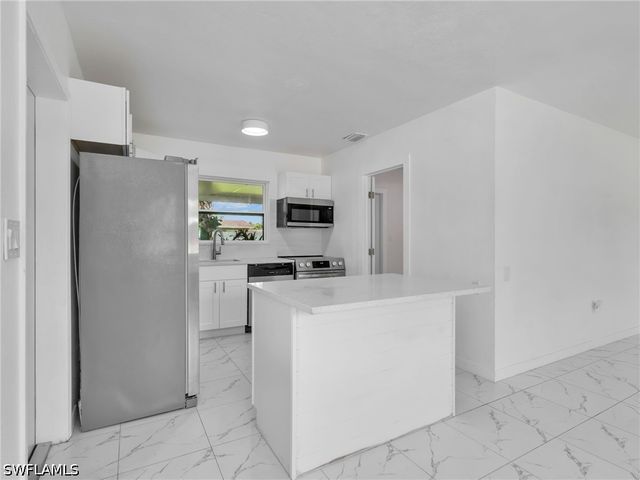 1196 Pine Lake DR, Cape Coral, FL 33909