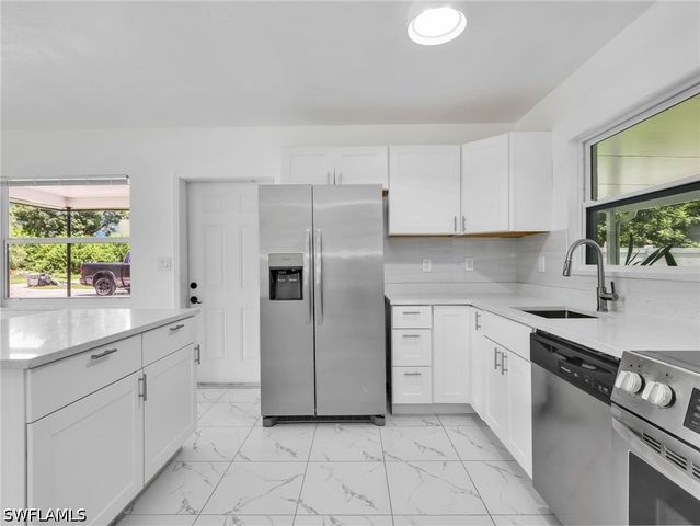 1196 Pine Lake DR, Cape Coral, FL 33909