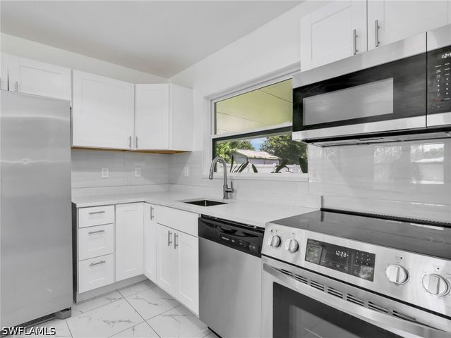 1196 Pine Lake DR, Cape Coral, FL 33909
