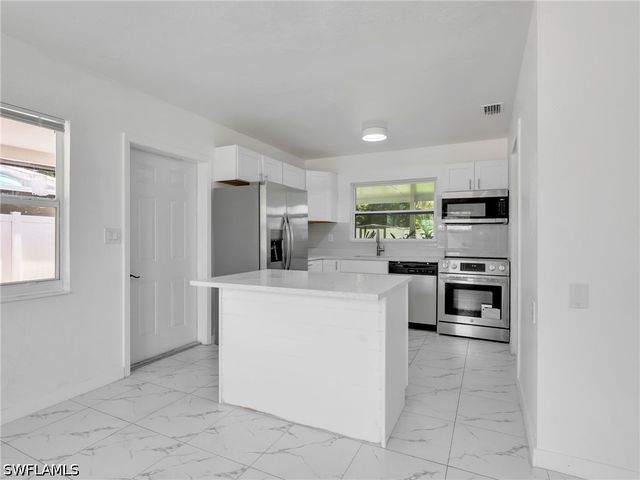 1196 Pine Lake DR, Cape Coral, FL 33909