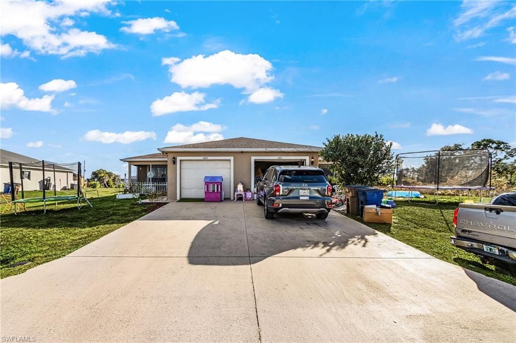 4409 & 4411 22nd ST SW, LEHIGH ACRES, FL 33973 — exterior