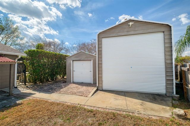 9714 POPLARWOOD COURT, Orlando, FL 32825