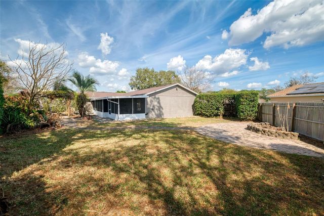 9714 POPLARWOOD COURT, Orlando, FL 32825