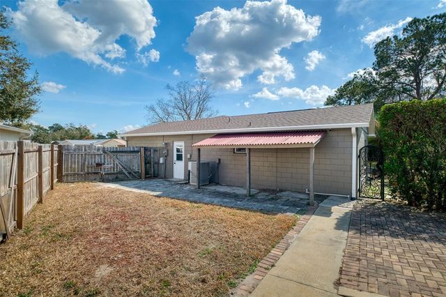 9714 POPLARWOOD COURT, Orlando, FL 32825