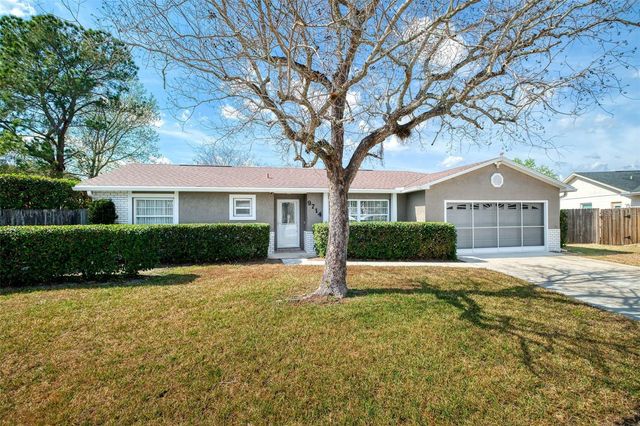 9714 POPLARWOOD COURT, Orlando, FL 32825