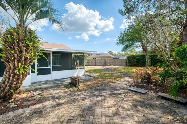 9714 POPLARWOOD COURT, Orlando, FL 32825