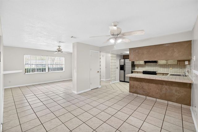 9714 POPLARWOOD COURT, Orlando, FL 32825