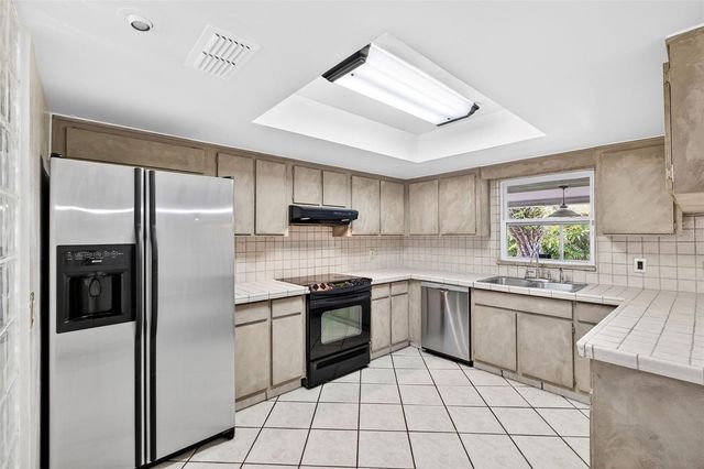 9714 POPLARWOOD COURT, Orlando, FL 32825