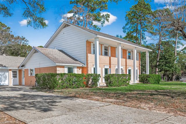 6210 Rippling Hollow Drive, Spring, TX 77379