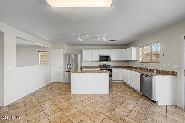 7304 S SUNSET Way, Buckeye, AZ 85326