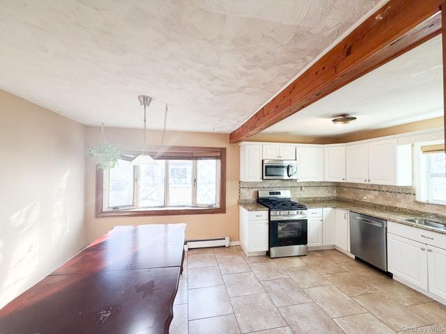 25 Ford Drive W, Merrick, NY 11758