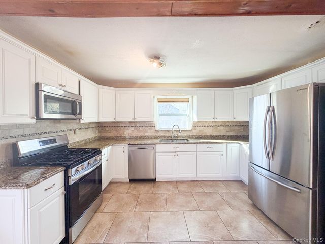 25 Ford Drive W, Merrick, NY 11758