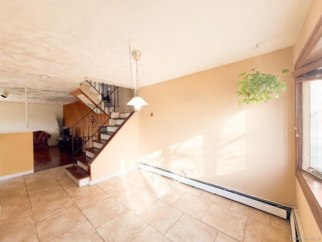 25 Ford Drive W, Merrick, NY 11758