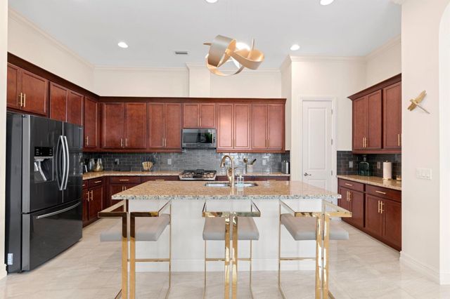 9091 Grand Prix Lane SW, Boynton Beach, FL 33472