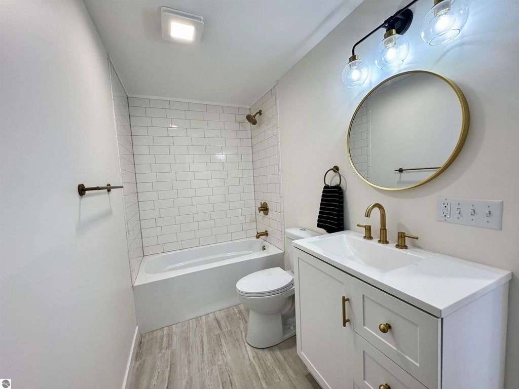 Image 12 of property listing at 5260 W Blair Townhall Road, Grawn, MI 49637