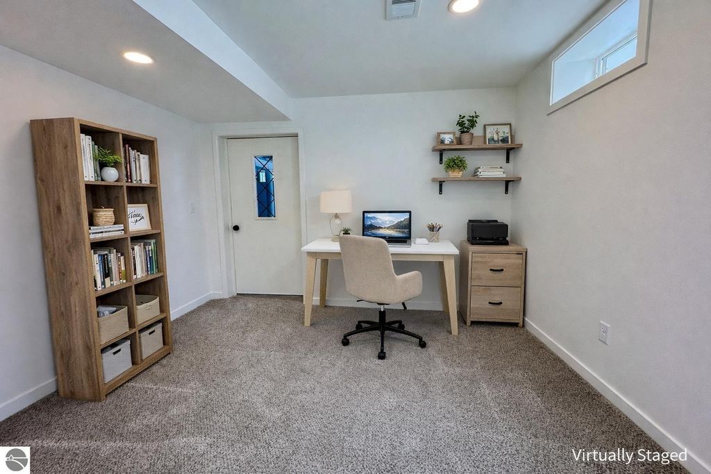 Image 15 of property listing at 5260 W Blair Townhall Road, Grawn, MI 49637