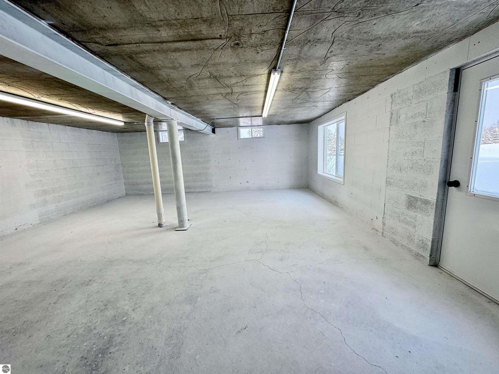 Image 16 of property listing at 5260 W Blair Townhall Road, Grawn, MI 49637