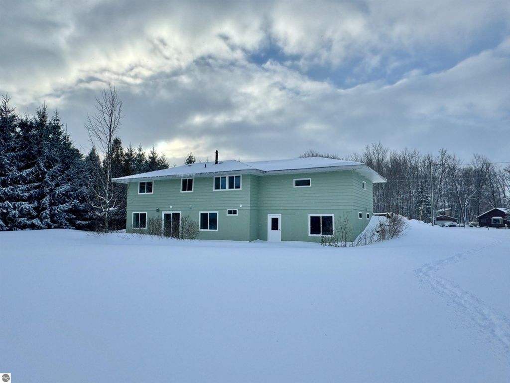 Image 2 of property listing at 5260 W Blair Townhall Road, Grawn, MI 49637