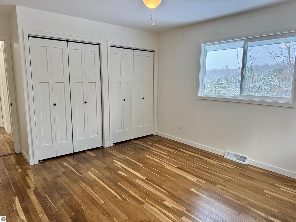 Image 24 of property listing at 5260 W Blair Townhall Road, Grawn, MI 49637