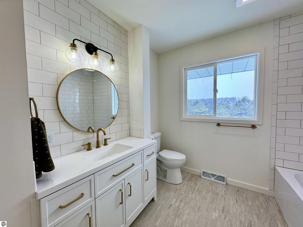 Image 25 of property listing at 5260 W Blair Townhall Road, Grawn, MI 49637