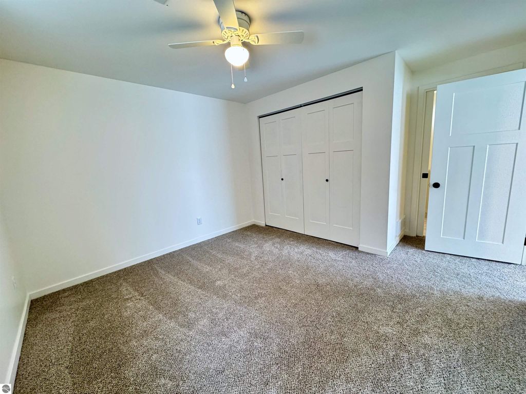 Image 28 of property listing at 5260 W Blair Townhall Road, Grawn, MI 49637