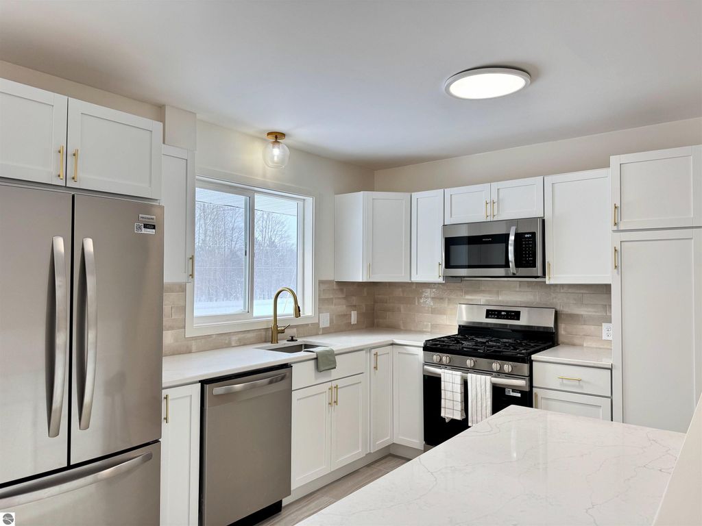 Image 3 of property listing at 5260 W Blair Townhall Road, Grawn, MI 49637