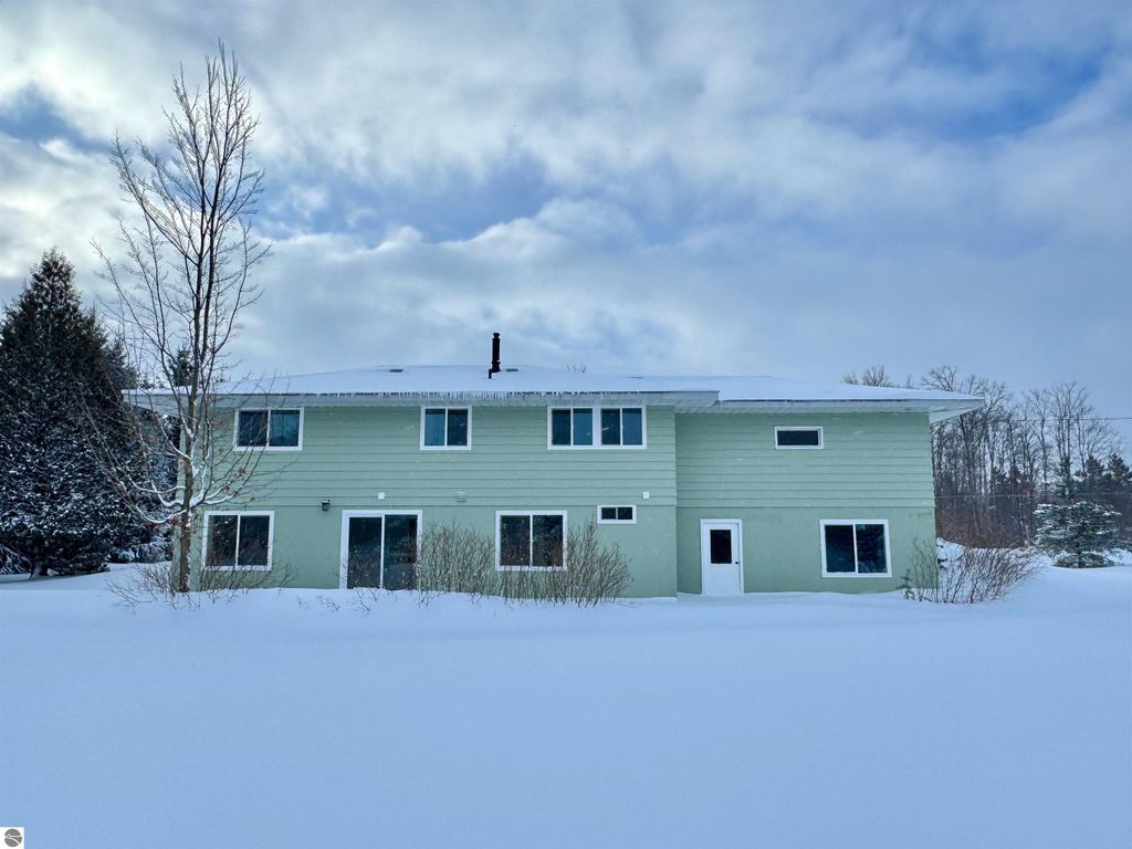 Image 30 of property listing at 5260 W Blair Townhall Road, Grawn, MI 49637