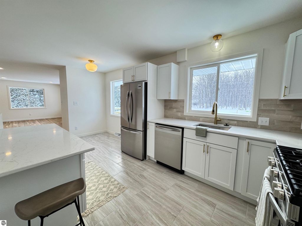 Image 4 of property listing at 5260 W Blair Townhall Road, Grawn, MI 49637