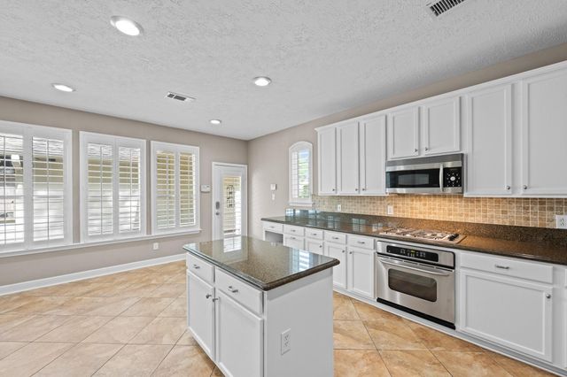 14343 Millstone Estates Lane, Cypress, TX 77429