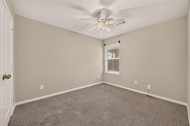 12038 Summertime Drive, Willis, TX 77318