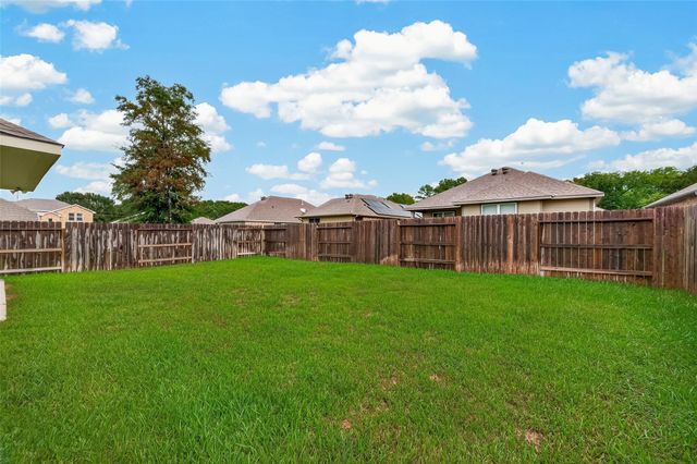 12038 Summertime Drive, Willis, TX 77318