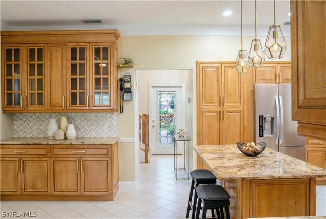 25335 Pinson DR, Bonita Springs, FL 34135