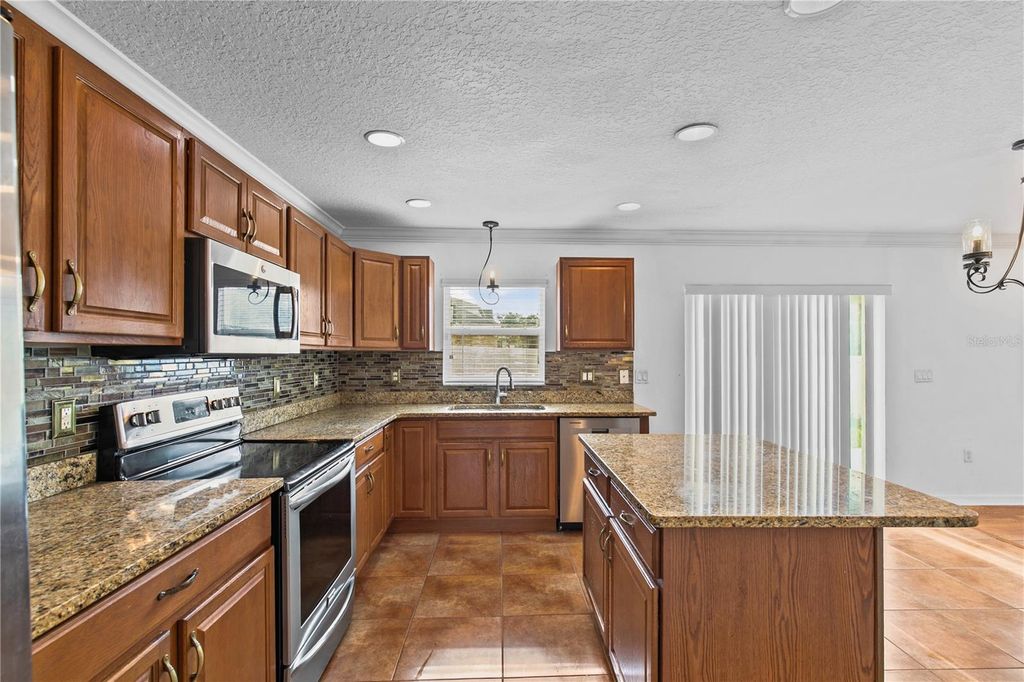 Image 8 of property listing at 8830 ISLA BELLA DRIVE, Orlando, FL 32818