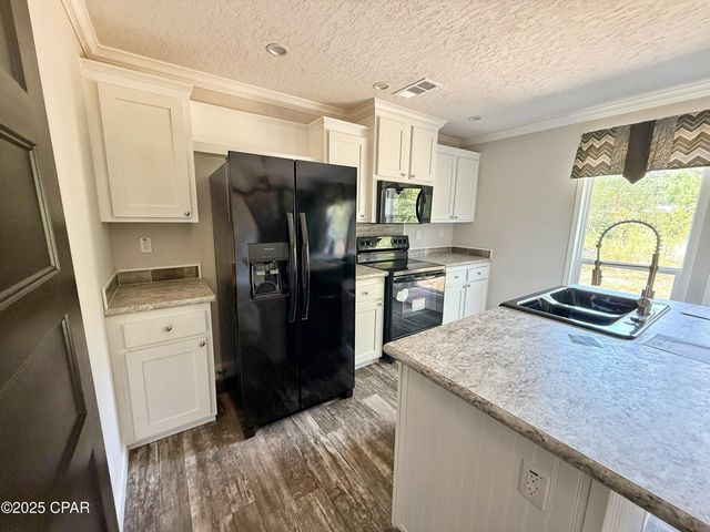 1818 Kaham Lane, Grand Ridge, FL 32442