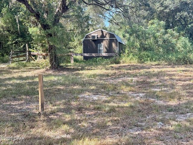 1818 Kaham Lane, Grand Ridge, FL 32442