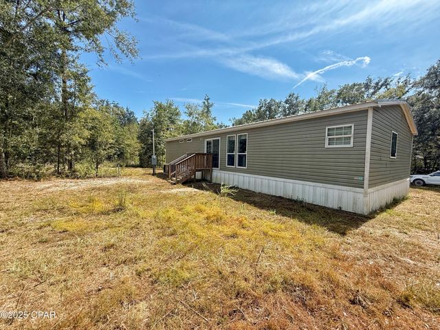 1818 Kaham Lane, Grand Ridge, FL 32442