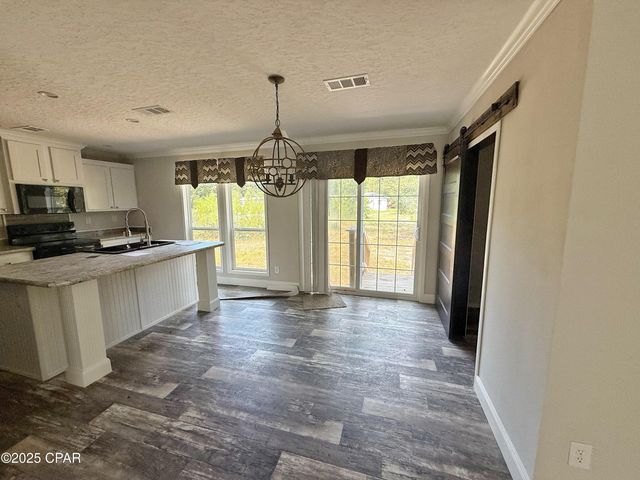 1818 Kaham Lane, Grand Ridge, FL 32442