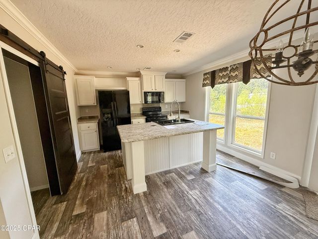 1818 Kaham Lane, Grand Ridge, FL 32442