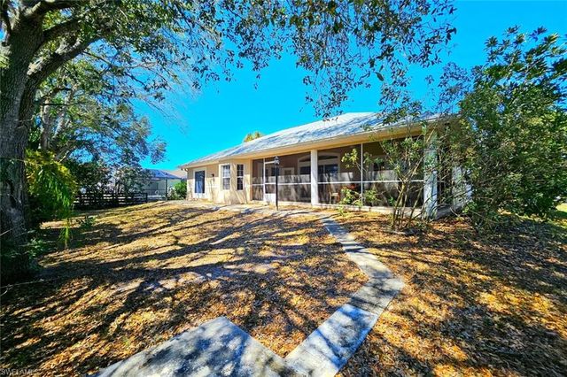 1440 Graham CIR, Lehigh Acres, FL 33936