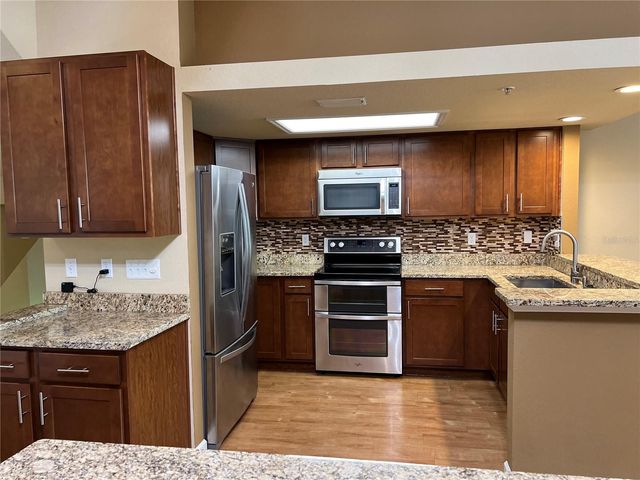 1383 CURLEW ROAD, Dunedin, FL 34698