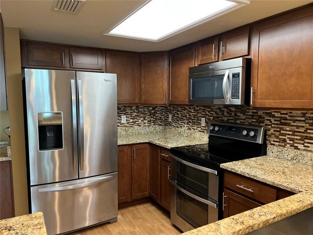 1383 CURLEW ROAD, Dunedin, FL 34698