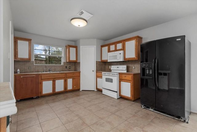 5518 Rio Alamo Street, Rosharon, TX 77583