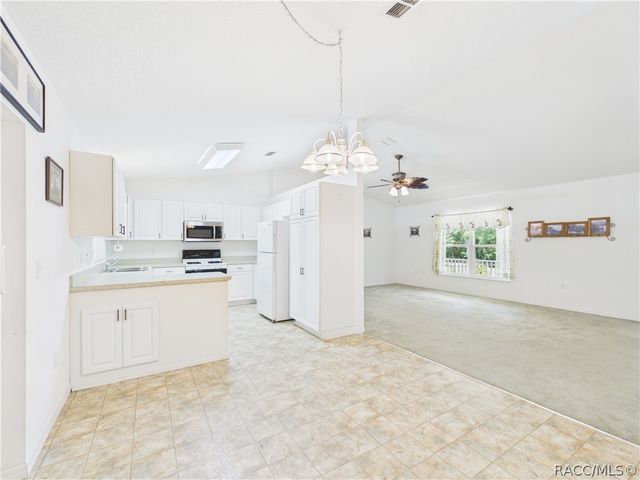 11236 N Rain Point, Inglis, FL 34449