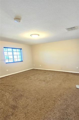 2014 Marsh Harbor Drive, Riviera Beach, FL 33404