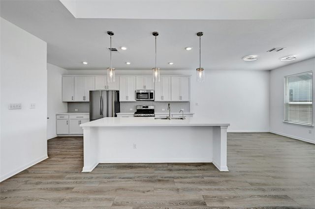 6411 Velvet Leaf LN, Buda, TX 78610
