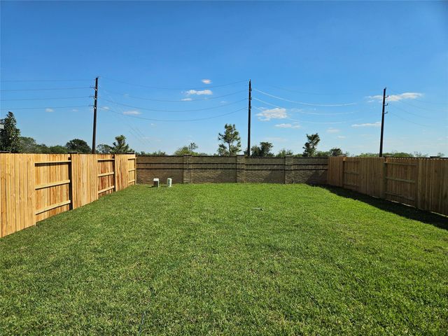 9011 Artic Rockfish Drive, Baytown, TX 77521