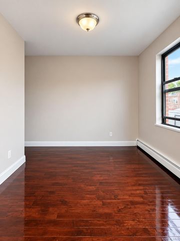 3257 84th Street, East Elmhurst, NY 11370