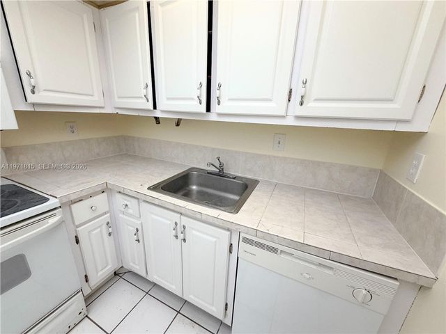 498 NW 165th St Rd D-202, Miami, FL 33169