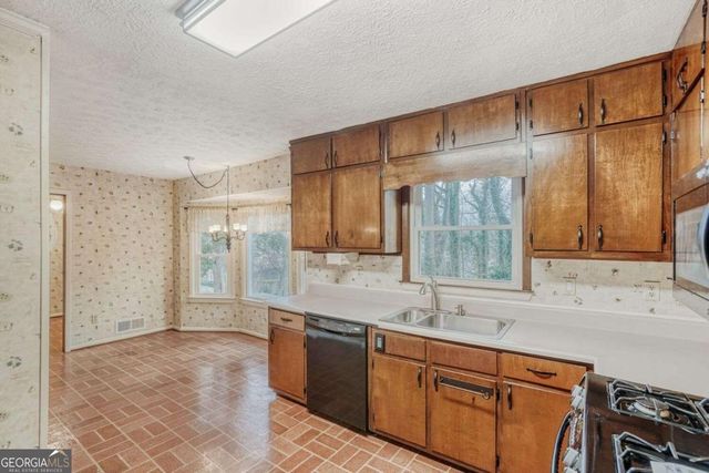 2032 Lake Lucerne Drive SW, Lilburn, GA 30047